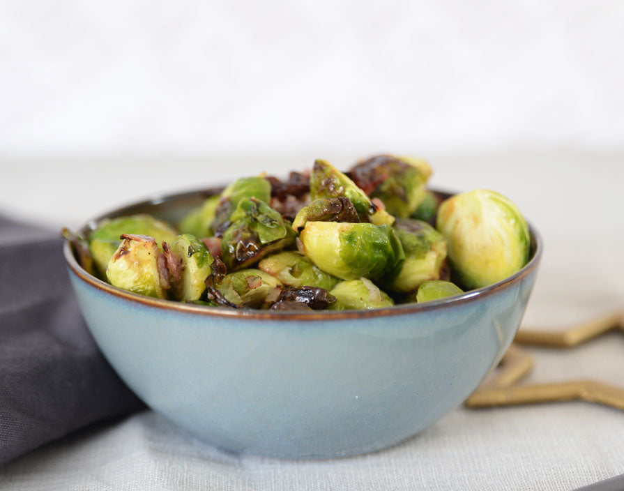 Geroosterde spruiten met spekjes